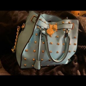 Michael Kors lock and key hand bag